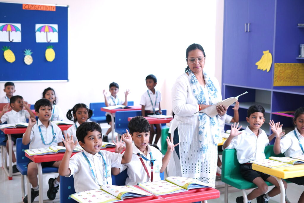 Aadya Academy school bus equipped with GPS and safety features for day scholars.